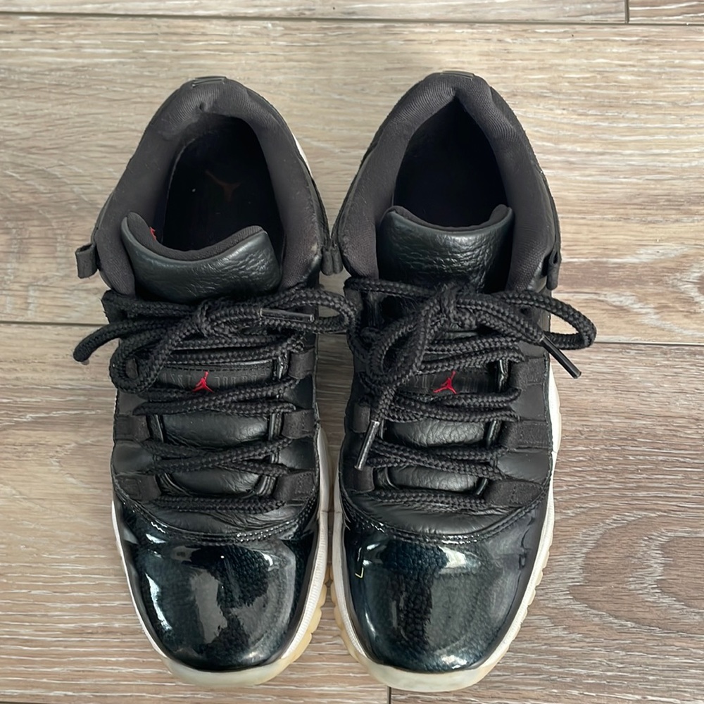 Jordan Retro 11 low black with white.